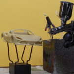 Karoseirija in airbrush pred nanašanjem primerja in barve